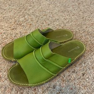 Green slip on open toe shoes